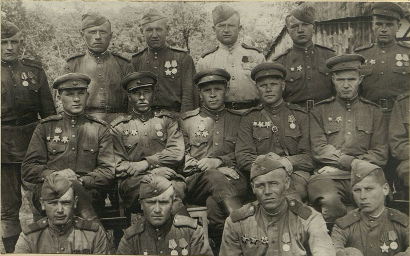 Image: From left to right 1st row: Sergeant Ilchishen, corporal Kadermetov, Senior Sergeant Kudryavtsev, private Rybin, 2nd row: Captain Bedin, Lieutenant Filchikov, Lieutenant Mokavichuk, Senior Lieutenant Troshin, Captain Koroleshin. 3rd row: Sergeant Major Abramov, Red Army soldier Ozhiganov, Private Semenenko, Red Army soldier Timoshenko, Lieutenant Ryabov, Senior Lieutenant Naumov
