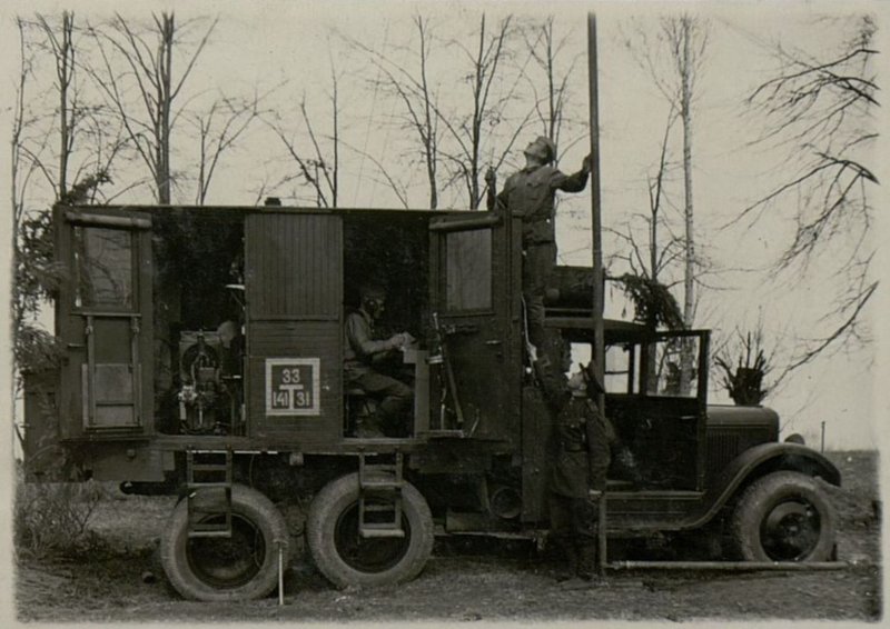 Image: Lieutenant Aneelov with a combat crew at the front-line automobile radio station