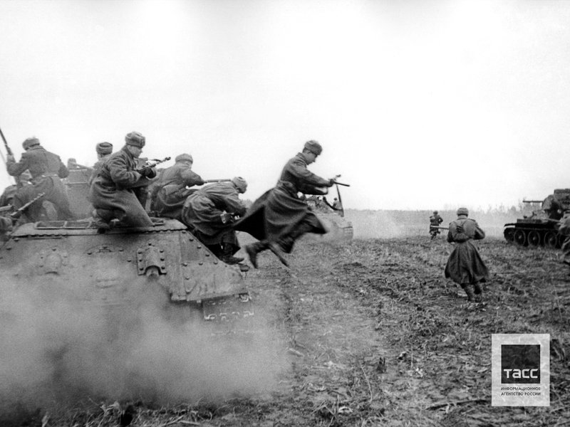 Soviet tanks with tank-borne infantry on the territory of the enemy on the outskirts of the city. Budapest, December 1944