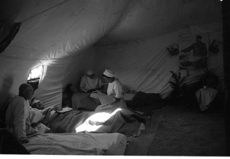 Delivery and treatment of the wounded in the field medical battalion near Sevastopol.