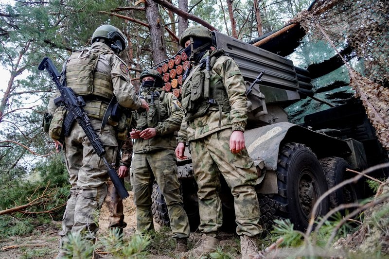 Operation of Grad MLRS in SVO Zone in Kherson region. Russia. Kherson region. Russian Armed Forces servicemen at Grad MLRS based on KamAZ truck in the Special Military Operation zone