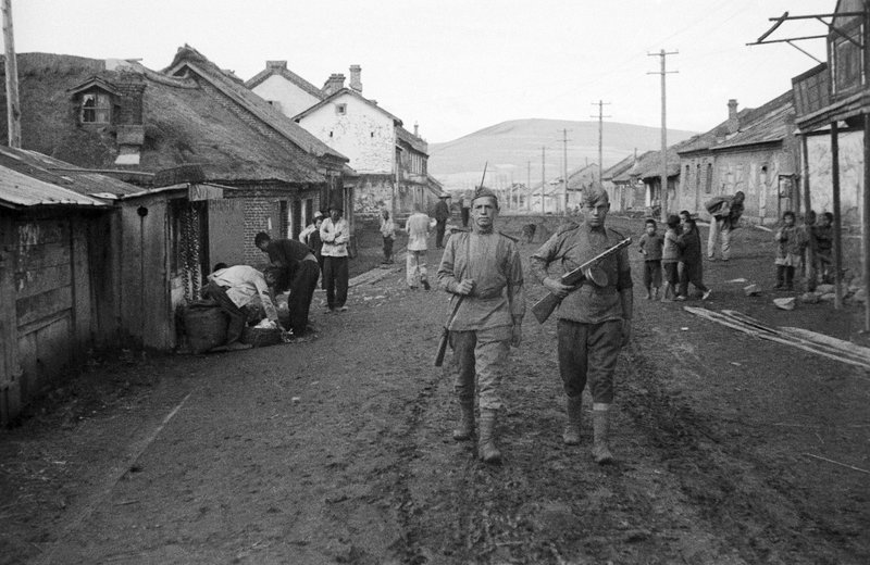 Soviet soldiers patrolling a village in Manchuria