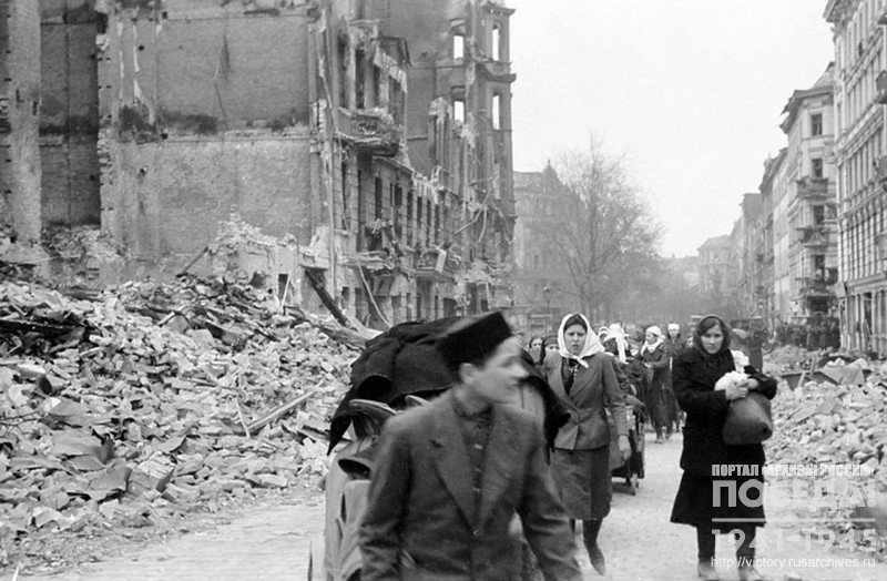 Soviet citizens released from captivity on a street of Berlin