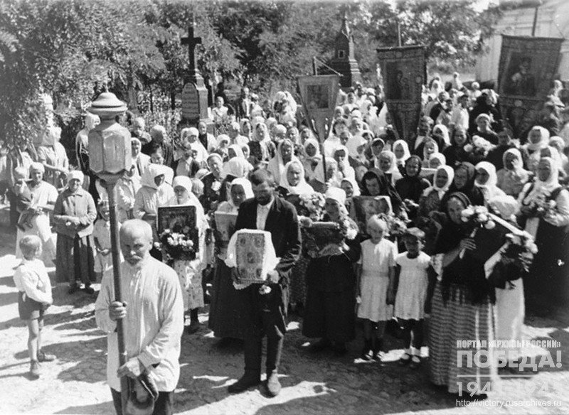 Religious procession in a village occupied by the Germans