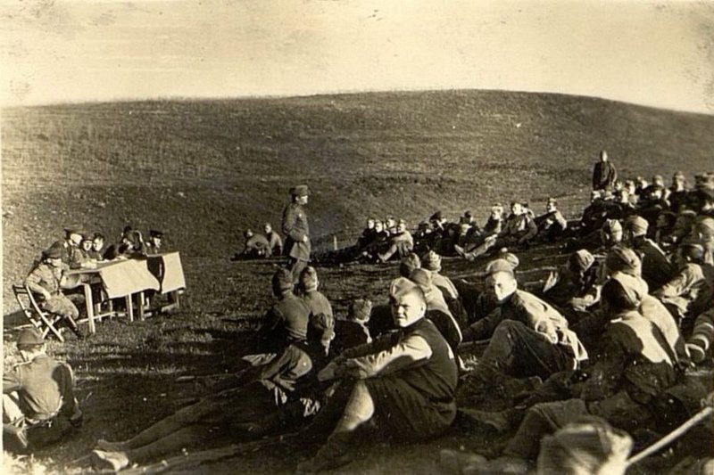 Image: Komsomol meeting of the regiment. Colonel Shabanov sets a task for the Komsomol