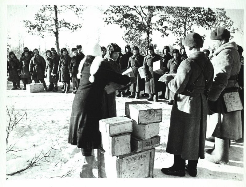 Giving out New Year presents for fighters of a military unit