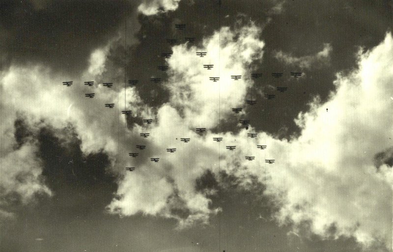 Aircrafts are forming a five-pointed star in the sky. Ceremonial parade rehearsal.