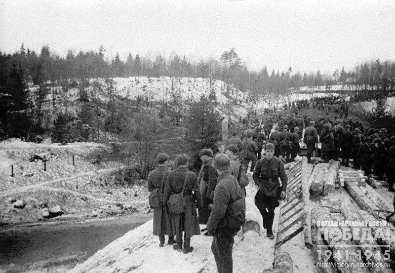 Engineer combat troops on bridge construction site in Finnish border area outpost of Jappinen

