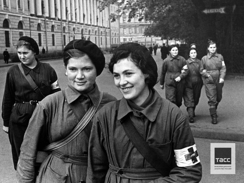 Soviet volunteer wartime nurses pose for a photo on a city street during the Siege of Leningrad. September, 1941