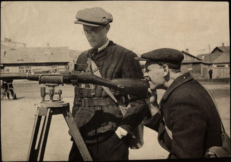 Workers of Dalstroy study small arms at Universal education lessons. Magadan. 1942-1943