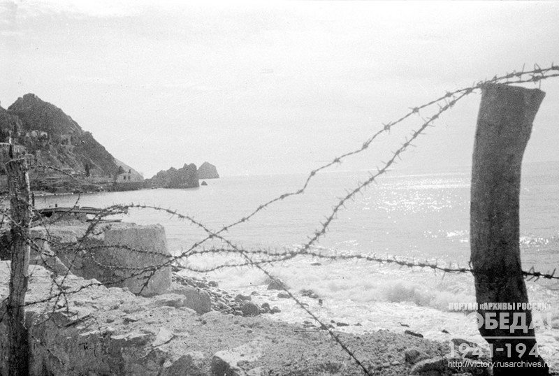 View of the German barbed wire fences that remained on the coast of Crimea after its liberation. Village of Simeiz, 1944