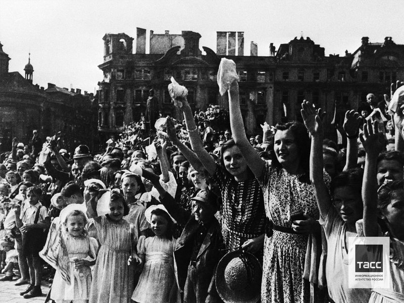 City residents meet soldiers of the Soviet Army who liberated the city, Prague, May 1945