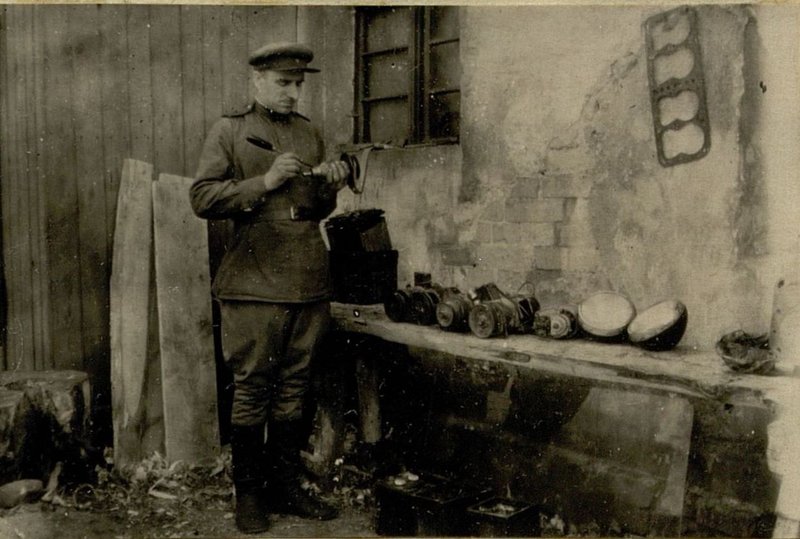 Image: Electromechanic - Jr. Sergeant Grebeniuk organized restoration of domestic and captured dynamos and batteries in his workshop