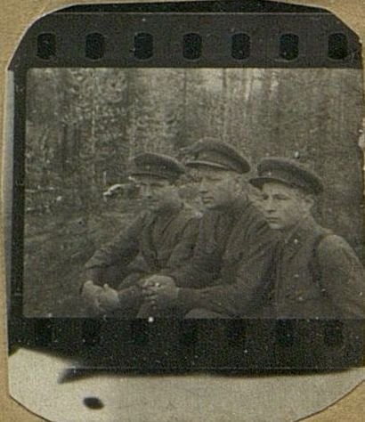 Image: From left to right: Komsomol organizer of the regiment Senior   Lieutenant   Oborotov, Party organizer of the regiment Captain Lysenko - and agitator of the regiment Senior   Lieutenant   Zhavoronkov. Karelian front 1942