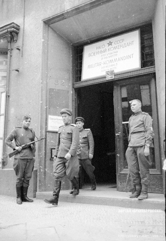 Captain V. Shorin, the Military Commandant of the 3rd section of the Mitte District leaves the commandant's office building