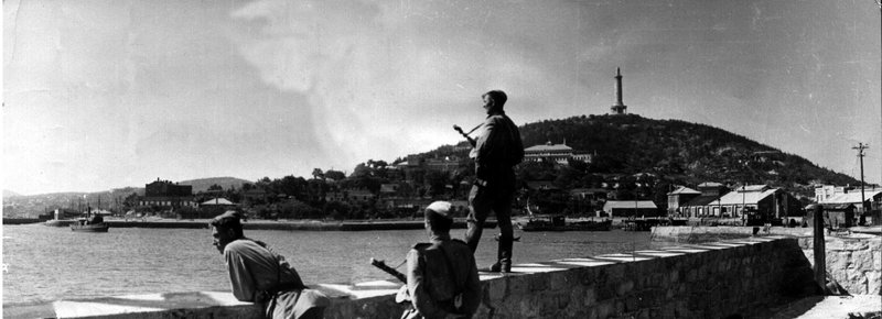 Soviet soldiers looking at the Eastern Basin in captured Port Arthur
