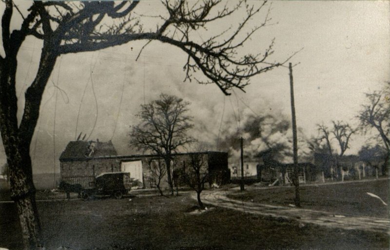 Image: The fight is over. A German settlement is on fire