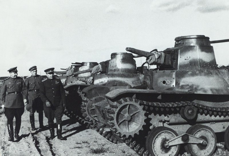 Colonel General A. Beloborodov with officers inspecting captured Japanese tanks