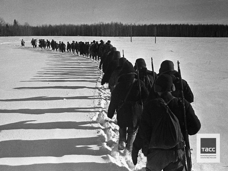 Soviet guerrillas sneak behind enemy lines, 1942.
