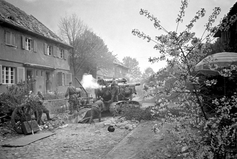 B-4 203-mm howitzer of Sergeant N. Meshkov in the suburbs of Berlin is firing at the Central districts of the city