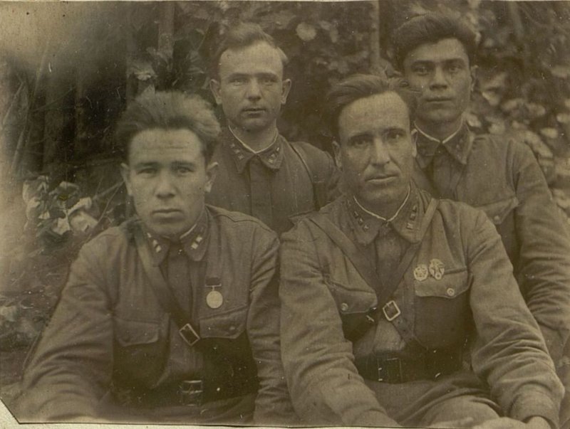 Image: In the bottom row: Chief of the regiment's communications, senior lieutenant Solopov, commander of the communications company, senior lieutenant Salychits. Top row: Deputy commander of the communications company for combat units, senior lieutenant Protsenko and deputy commander of the communications company for political affairs, junior political instructor Volkov