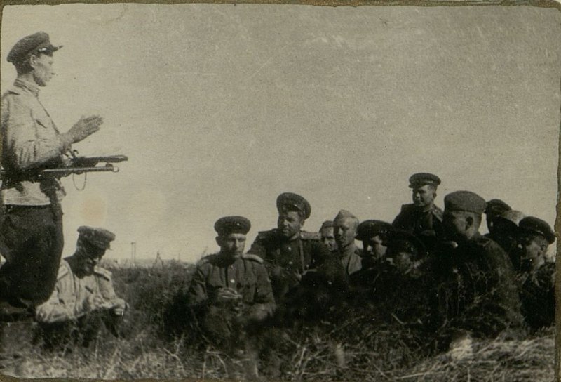 Image: After the capture of the city of Hulin, the communists of the party headquarters organization of the 31st separate machine-gun and artillery battalion (OAPB) summarize the results of their work
