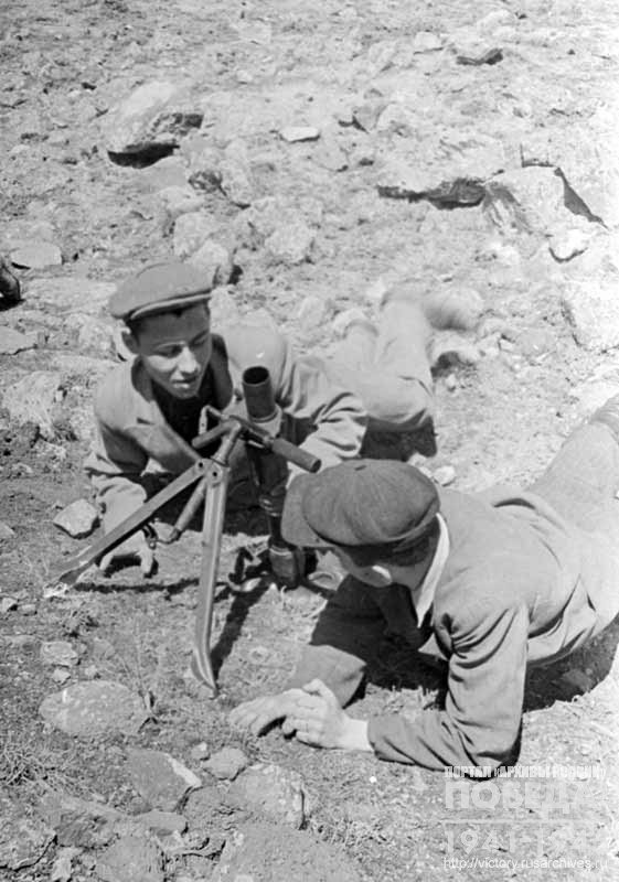 Vsevobuch fighters from Yerevan N. Budarin and P. Gevorkian at the firing position with a mortar
