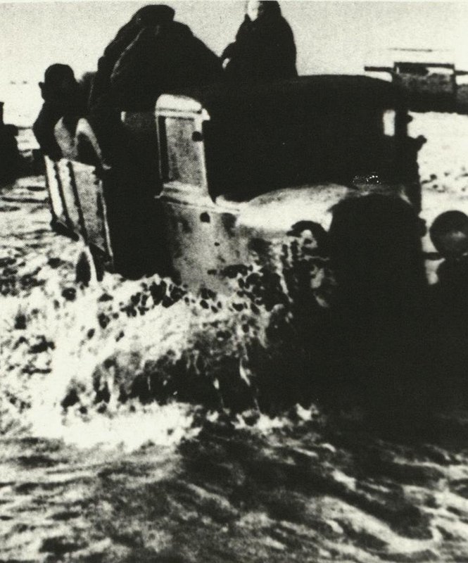 People evacuation from besieged Leningrad by cars along "Road of Life"