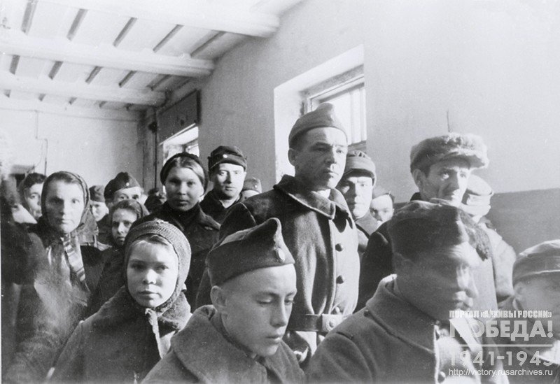 Latvian volunteers and workers are listening to a radio broadcast of the speech of Lieutenant General A. Vlasov