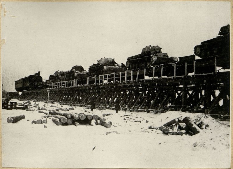 Image: Train transporting tanks passing over the bridge in Leningrad on 5 Feb. 1943