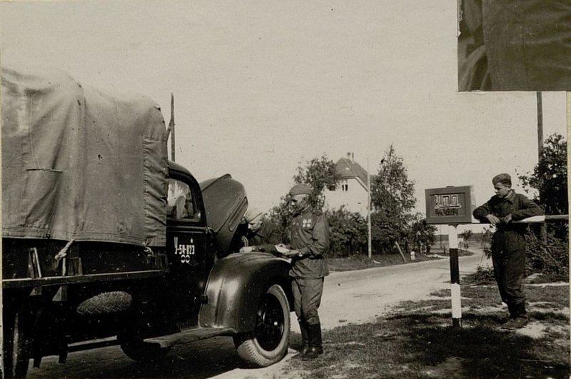 Image: 124 separate motor transport battalion. Car at the checkpoint.