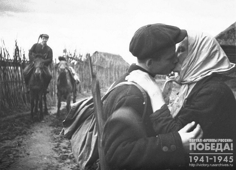 Collective farmer one of the villages sending her son to a partisan detachment