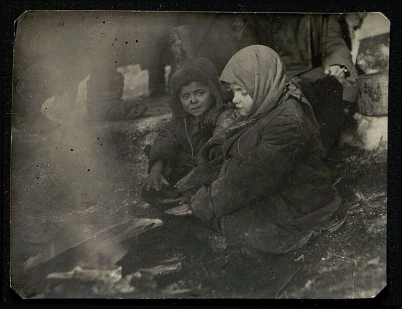 Original image: Lyova, 3 years old, Zina, 6 years old, warming up by the fire