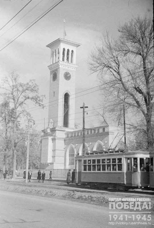 A tower with chiming clock, erected in the Central Park of Tashkent to commemorate the Victory of the Soviet people in the Great Patriotic War