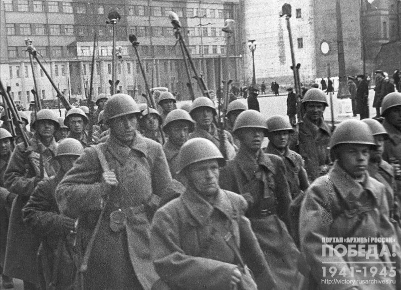 The Soviet soldiers colomn in one of the capital's streets