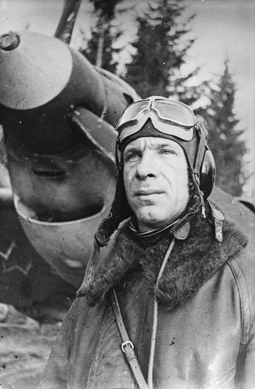 Major P.I. Laukhin, twice decorated with Red Banner order near a plane