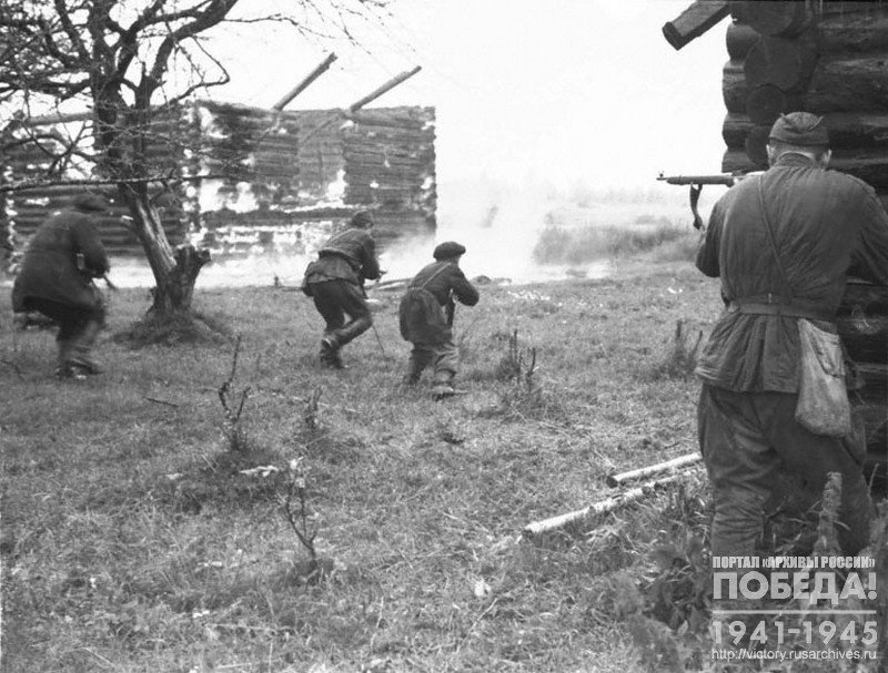 Partisans knocking the German punitive detachment out of the village