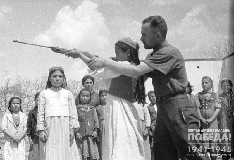 School children of the collective farm Kzyl Kahraman of the Komsomolskiy District of the Uzbek SSR during military training