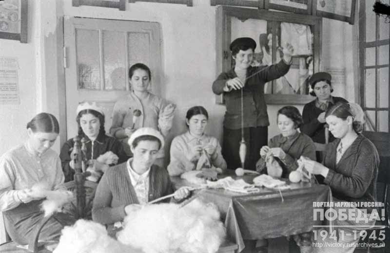 Employees of the Ordzhonikidze City Hospital knit gloves and socks for Soviet soldiers
