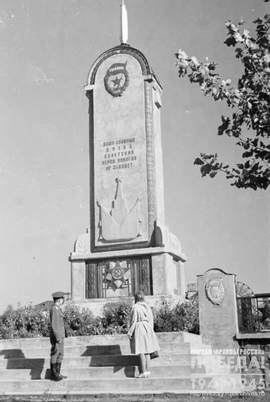 Near a memorial to the Soviet soldiers