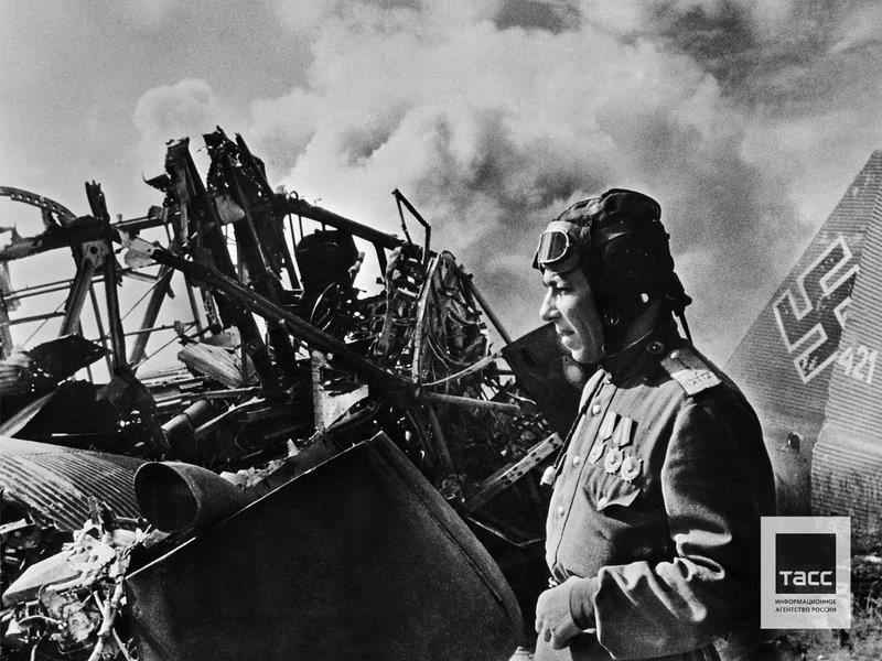 Junior lieutenant Nikonay Kiselev near the ninth German plane shot down by him