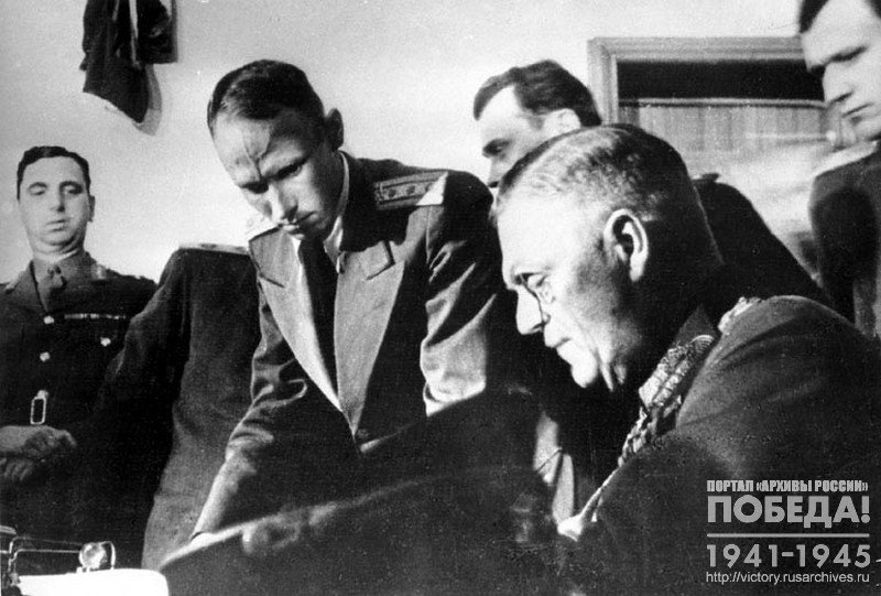 Field Marshal Wilhelm Keitel signing Act of all German armed forces  unconditional surrender