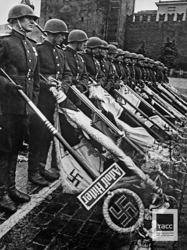 Soviet soldiers with lowered German banners during the Victory Parade. Moscow, June 1945