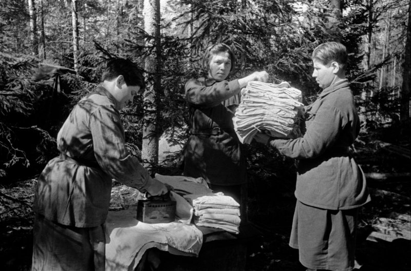 Washerwomen-soldiers of 19th Guards Infantry Regiment of 8th Guards Panfilov Division ironing underclothes.