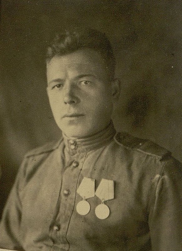 Image: The squad leader, the driver of the GAZ-AA car, Sergeant R.P. Demchenko, who covered 107,465 kilometers in 1944-45. transported 2751 tons of cargo