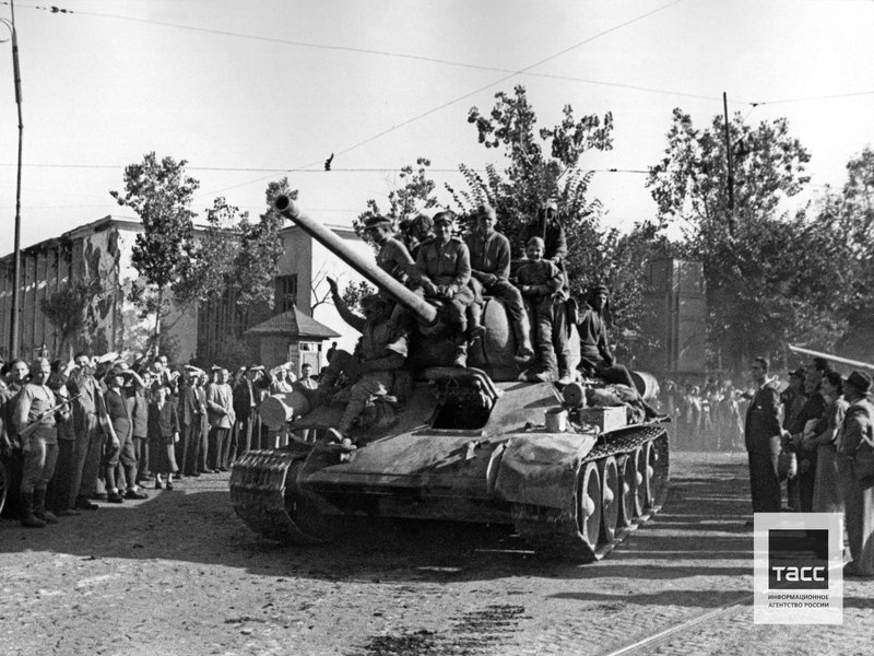 City residents giving a warm welcome to the Soviet tankmen. Bucharest. August, 1944