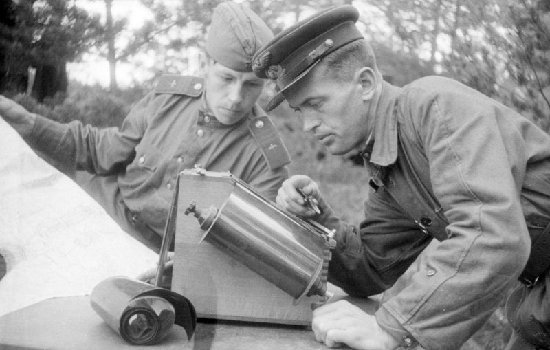 Chief of aerial photogrammetry, Petty Officer I. Zaykovsky (right) and photogrammetrist, Sergeant A. Fedorov (left)