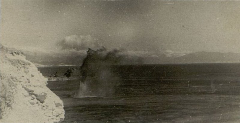 Image: The coast of "Small land" was shelled day and night. Thousands of shells and bombs exploded on land and water
