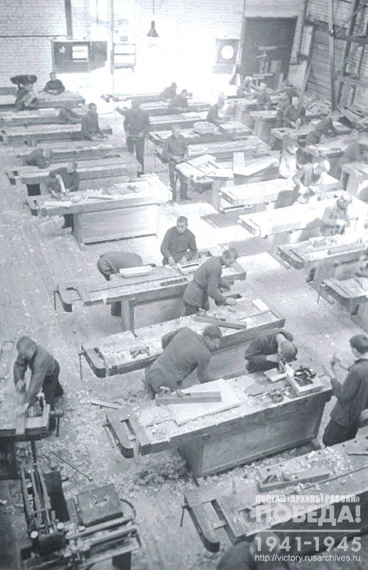 Interior of a carpenter's shop in one of the factories, where students of the tradesmen school #2 are working