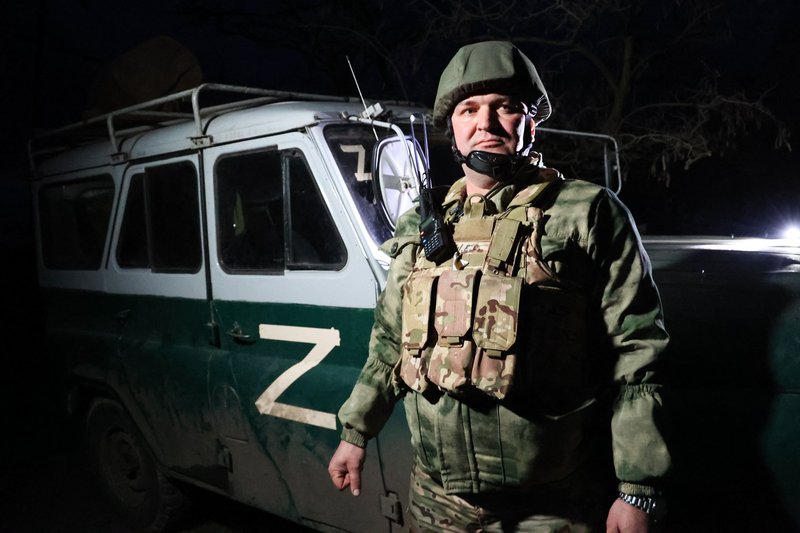 Operation of volunteer battalion named after Andrew the First-called in Zaporozhye region. Russia. Zaporozhye region. Night patrol of serviceman going forward with anti-tank guided missile
